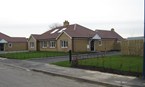 Construction of new 2 bedroom bungalows included access roads & off road parking
